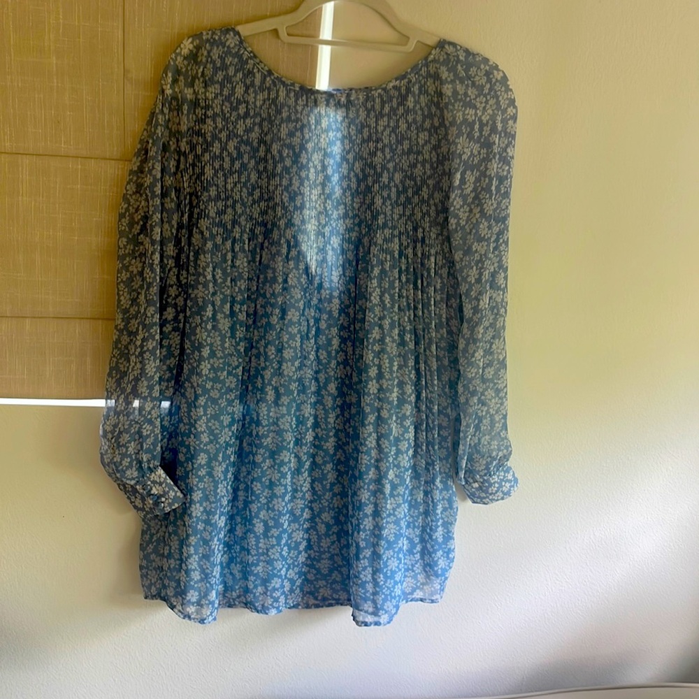 Super cute babydoll dress with a low back. Perfect for the summer!